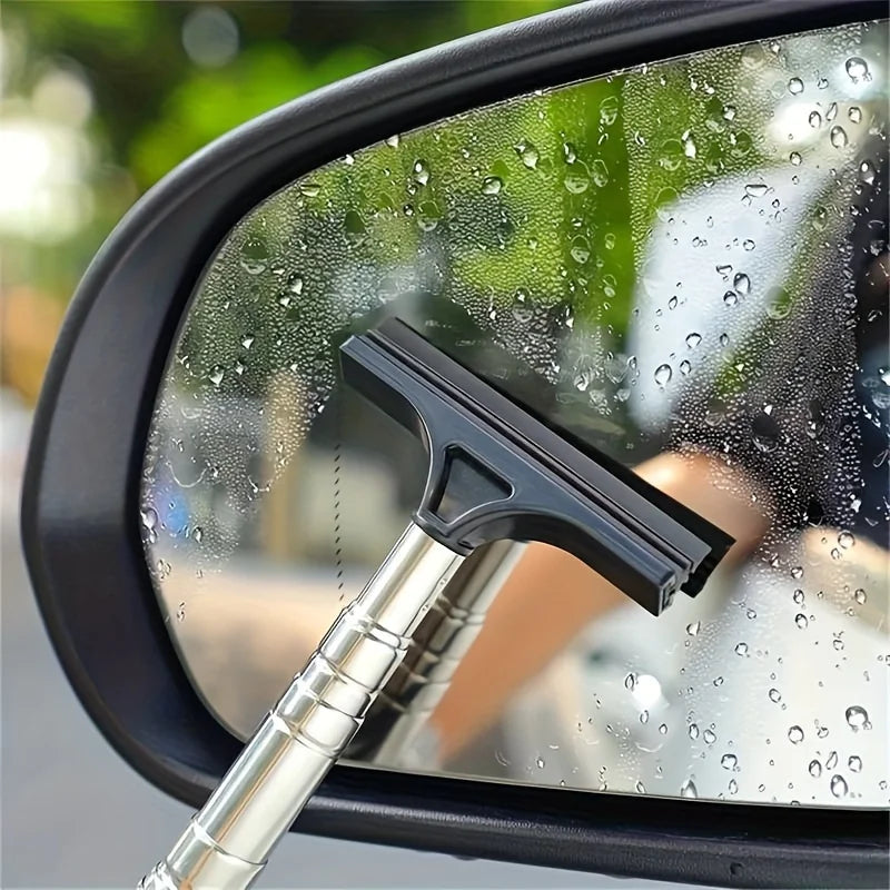 Limpa-retrovisores telescópico preto a tirar as gotas de água do retrovisor